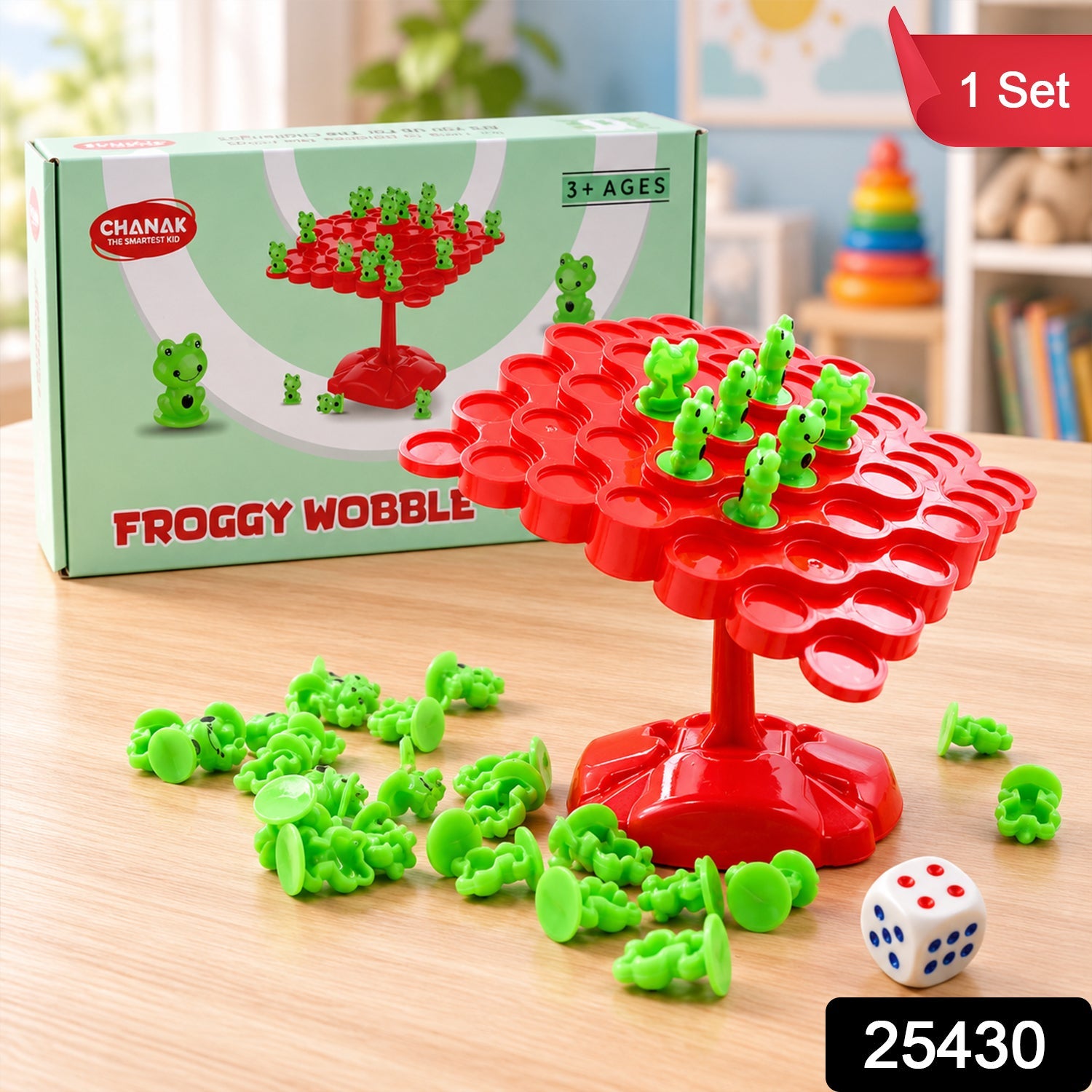 A red balancing board game with green frog pieces and a white dice, next to its green and white product box.