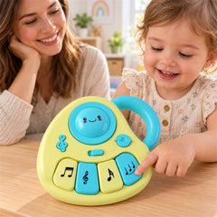 A smiling child and adult interact with the yellow and blue musical toy on a light wooden table.