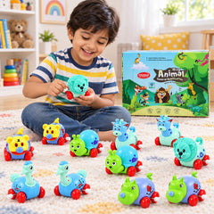 A young boy smiles while playing with a light blue wind-up lion toy, surrounded by other colorful animal toys on a rug.