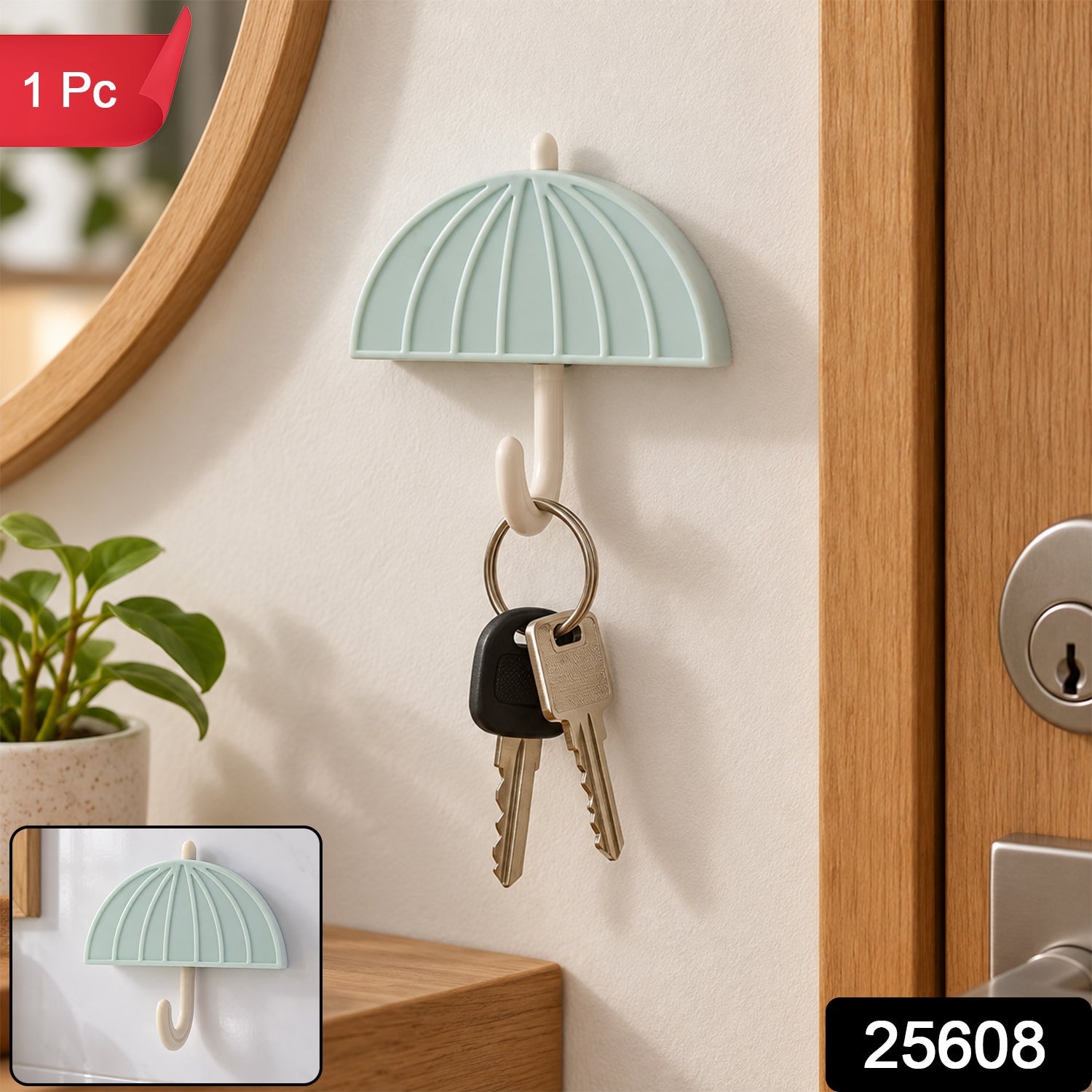 Umbrella-shaped hook with keys on a wall, with a small inset showing the hook alone.