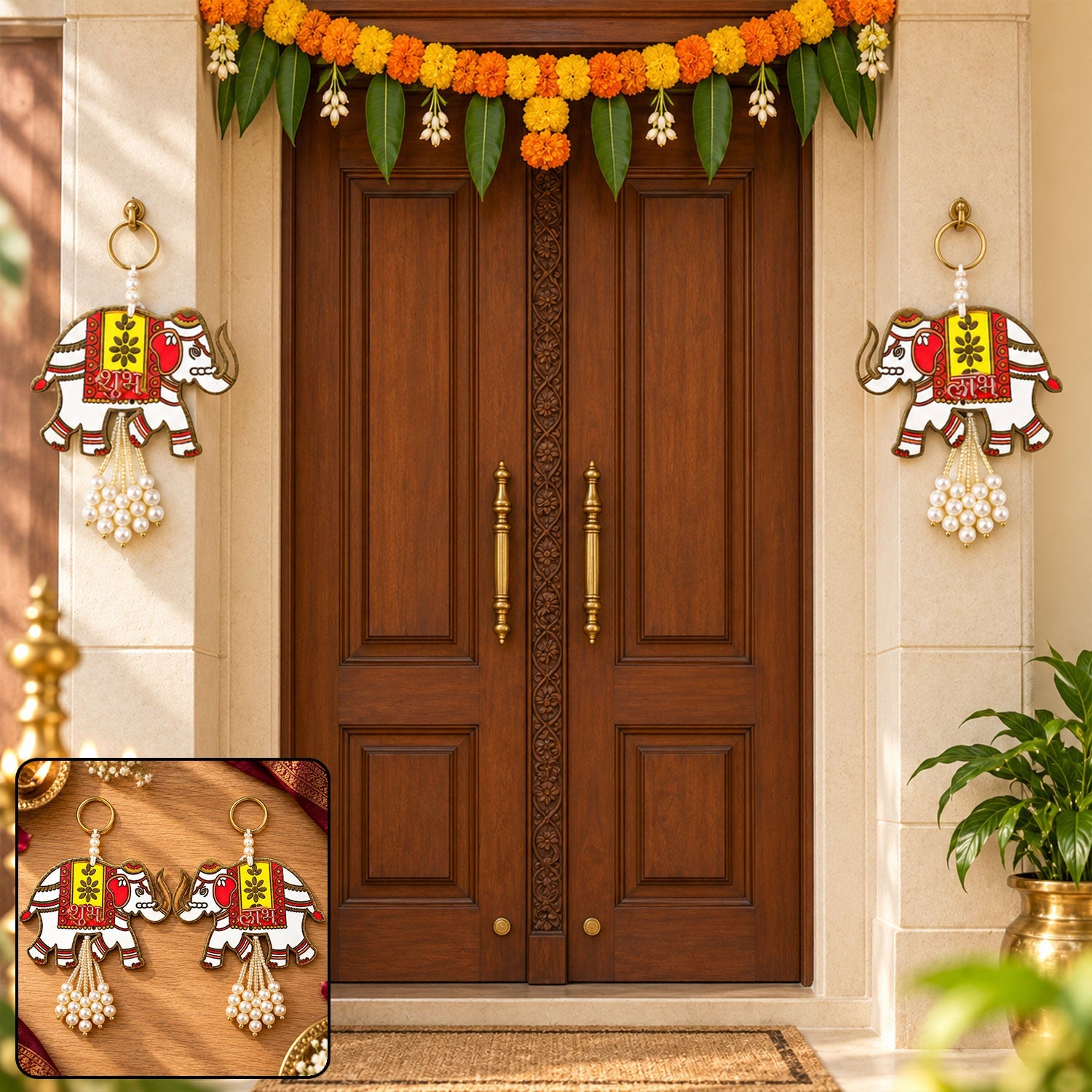 Two elephant hangings with pearl tassels adorn a wooden door, surrounded by festive marigold decorations.