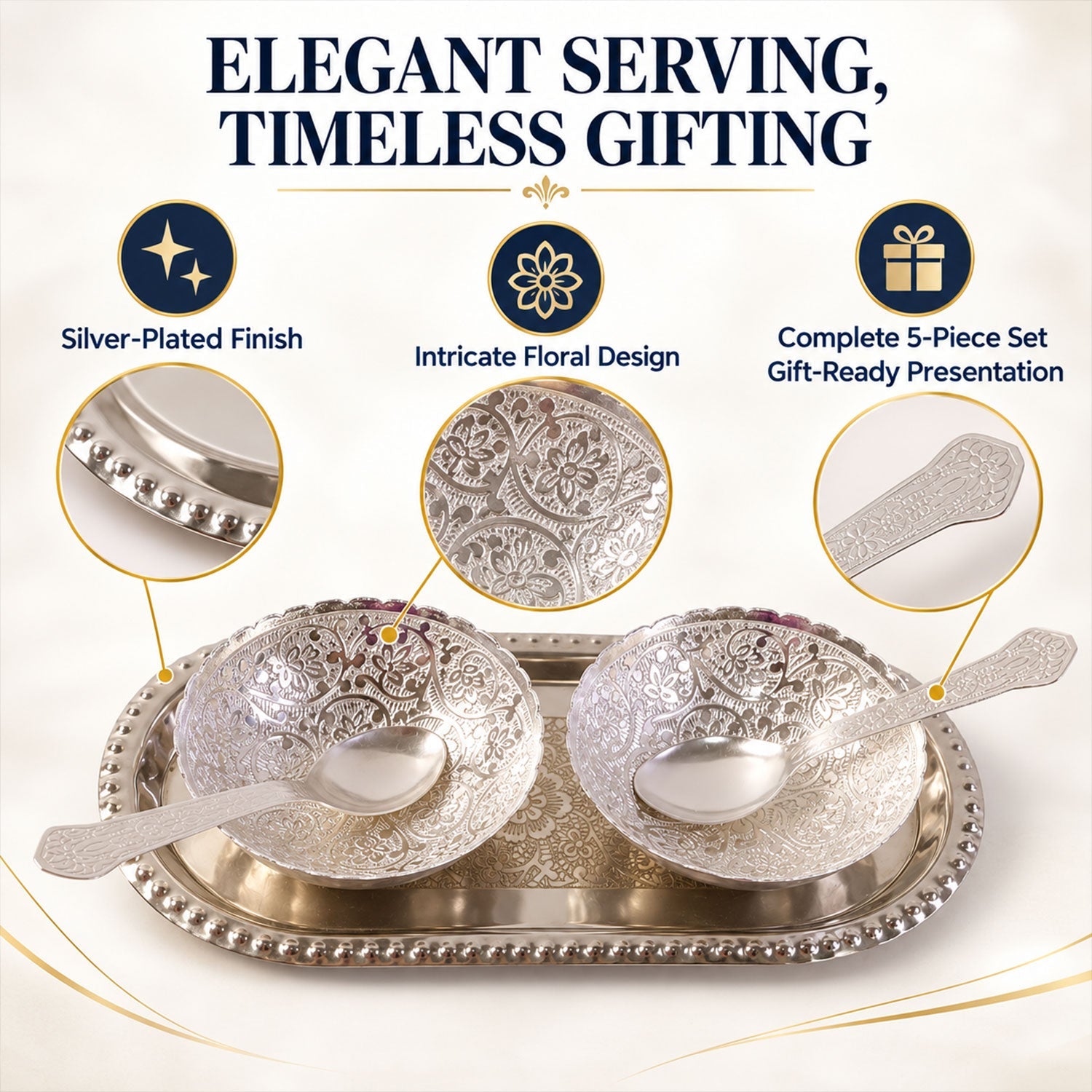 A silver-plated serving set with two bowls, two spoons, and an oval tray, highlighting intricate floral designs.
