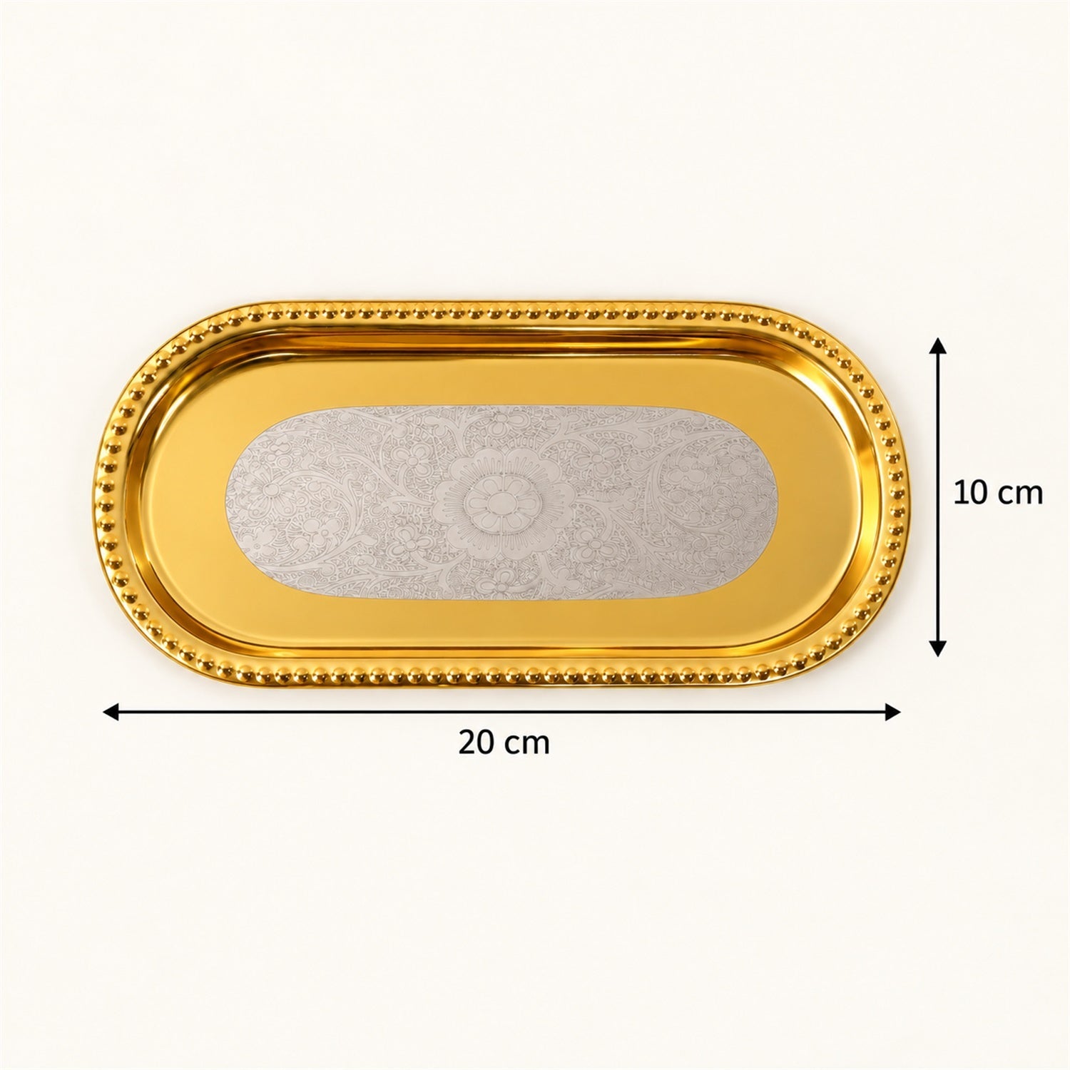 A golden oval tray with a silver floral pattern, showing dimensions of 20 cm length and 10 cm width.