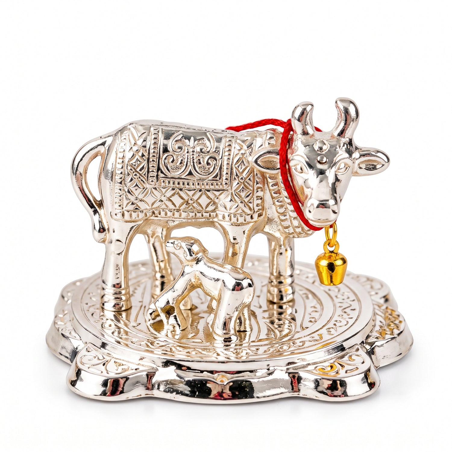 A detailed front view of the silver Kamdhenu cow and calf idol on a white background.