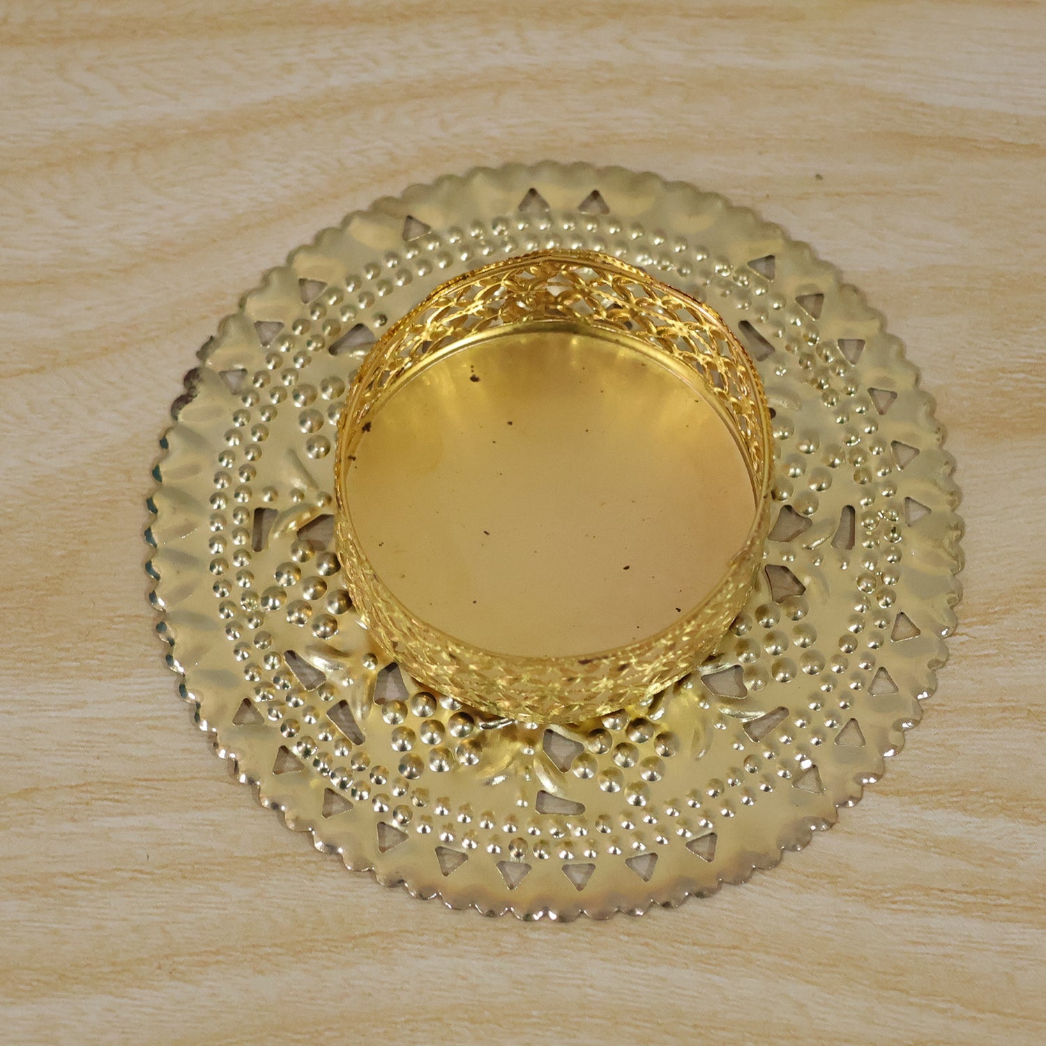 Actual product shot of the gold tone metal jali tealight holder