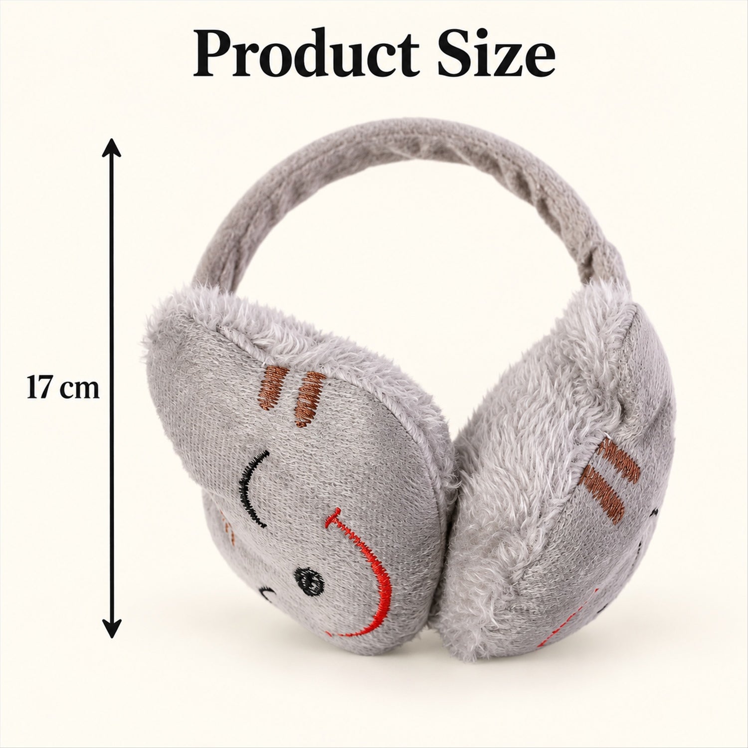 Grey plush earmuffs with a red embroidered smiley face, showing a 17 cm height measurement on a light background.