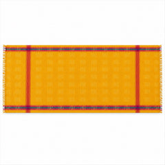 A yellow dupatta with subtle woven patterns and colorful striped borders is laid flat on a white background.