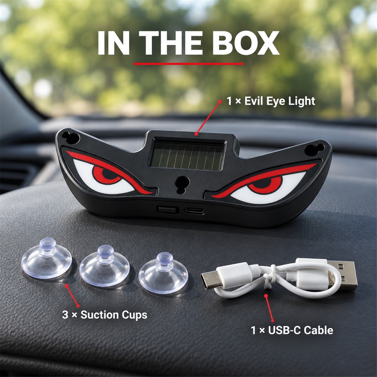 Contents of the box: one black evil eye light, three suction cups, and one white USB-C charging cable on a car dashboard.