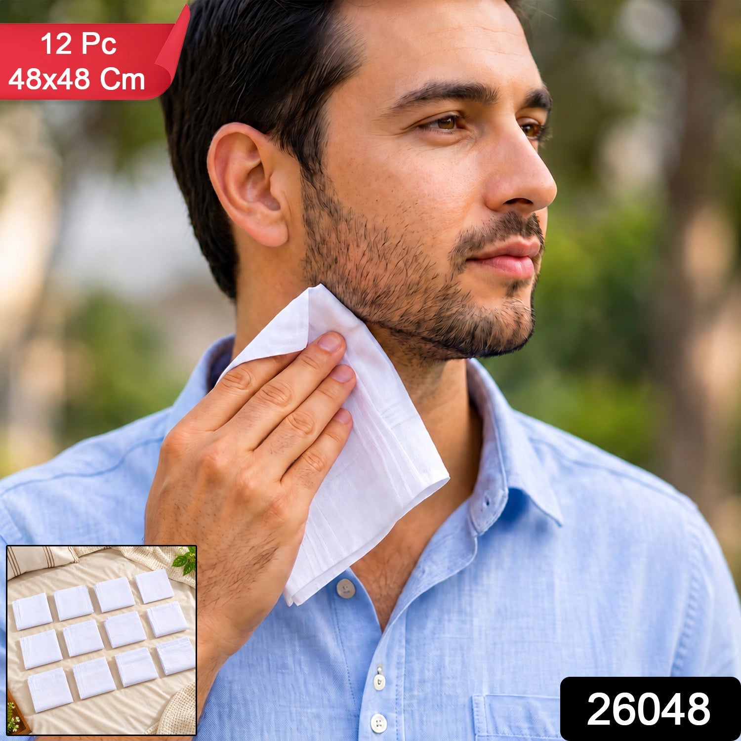 A man in a blue shirt dabs his cheek with a folded white cotton handkerchief; an inset shows twelve folded handkerchiefs.
