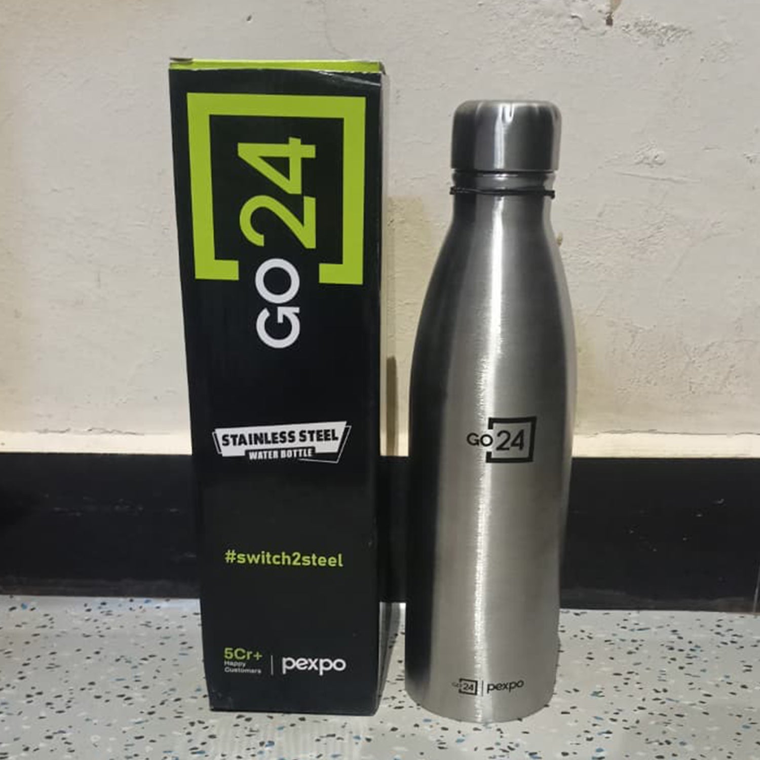 Stainless steel insulated water bottle in a daily use setting