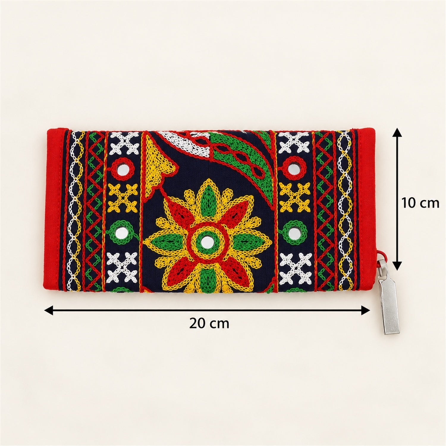 The embroidered clutch is shown on a light background with arrows indicating its dimensions of 20 cm length and 10 cm height.