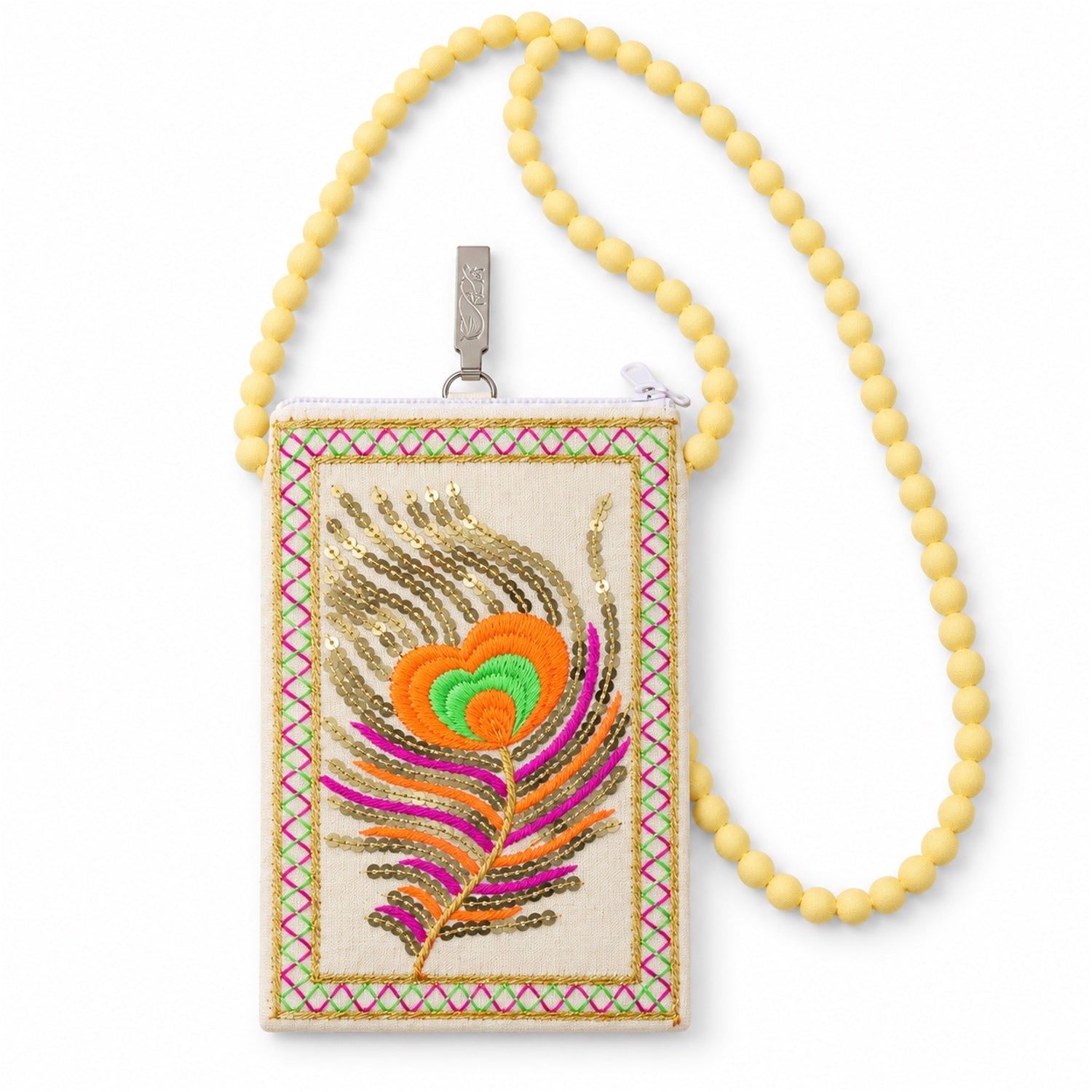 A cream mobile phone pouch with a colourful embroidered peacock feather and a long yellow beaded strap is displayed on a