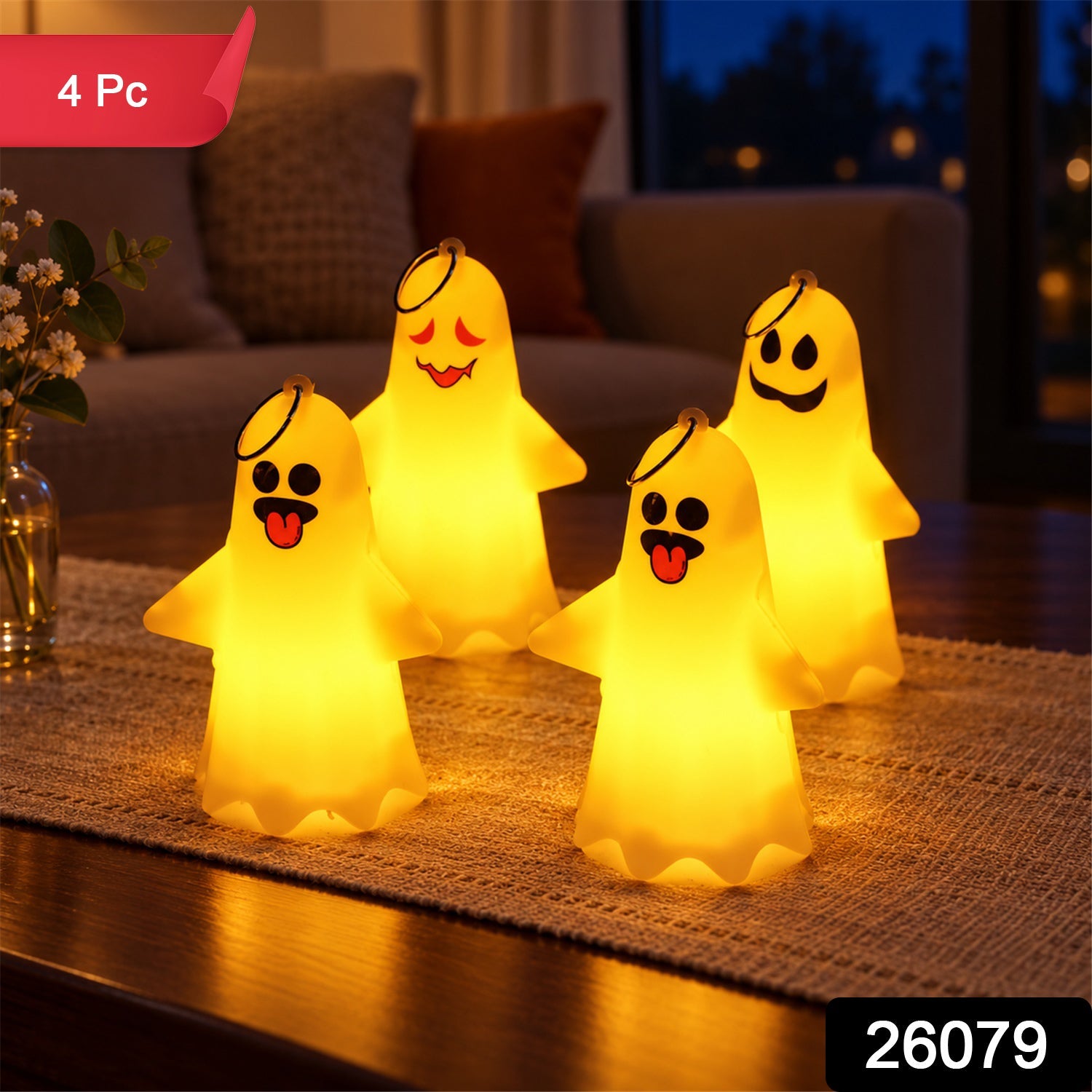 Four luminous ghost lights with unique faces sit on a table, with a