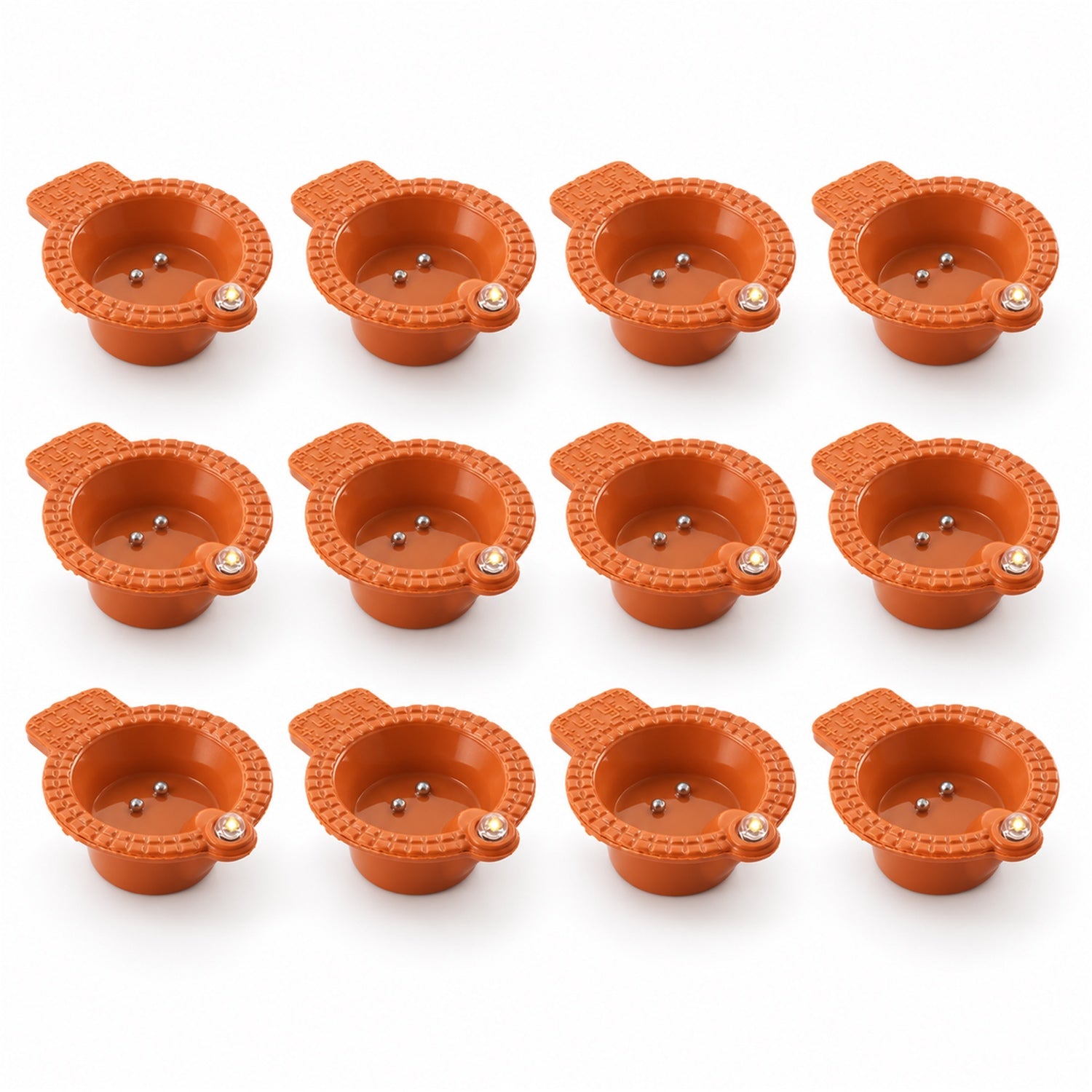 Water sensor flameless LED diyas in a festive arrangement on a table