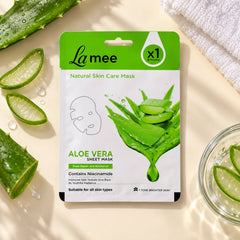 Person applying an aloe vera facial sheet mask to their face