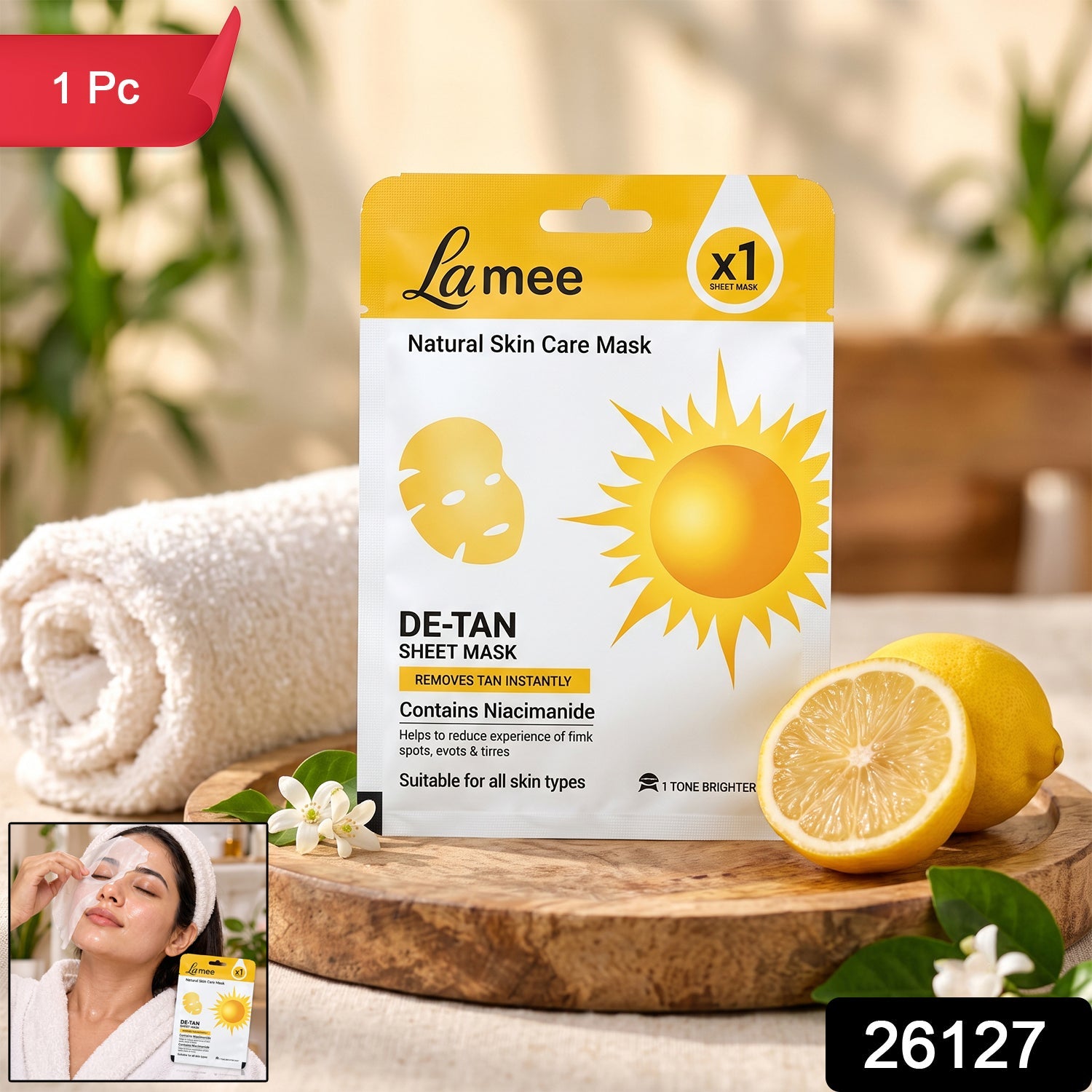 Product packaging for a de-tan sheet mask with a small inset image of a woman applying a facial mask.