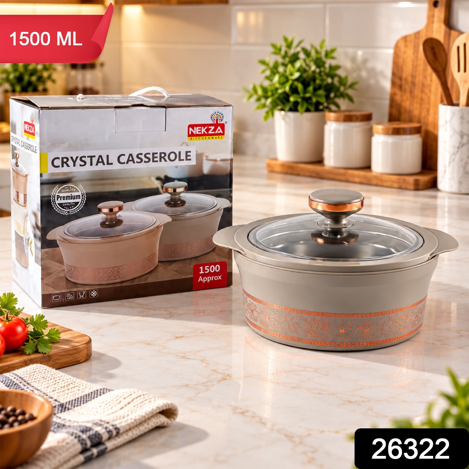 A gray insulated casserole dish with a clear lid and copper knob on a marble counter, with its product box displaying 1500