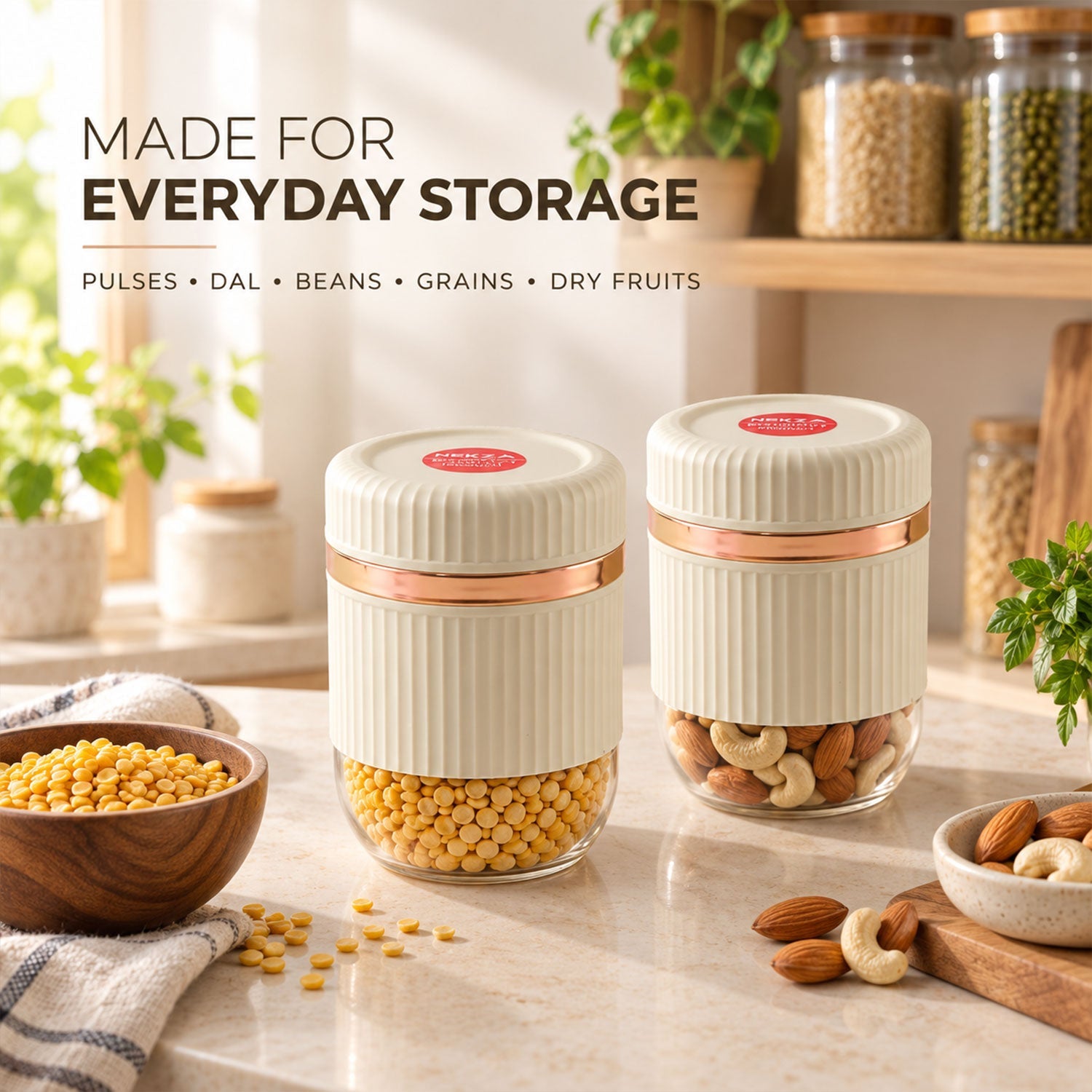 Two cream and clear ribbed containers, one with lentils and one with nuts, on a kitchen counter with other food items.