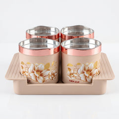 Four beige floral containers with rose gold lids, on a matching beige serving tray, against a white background.