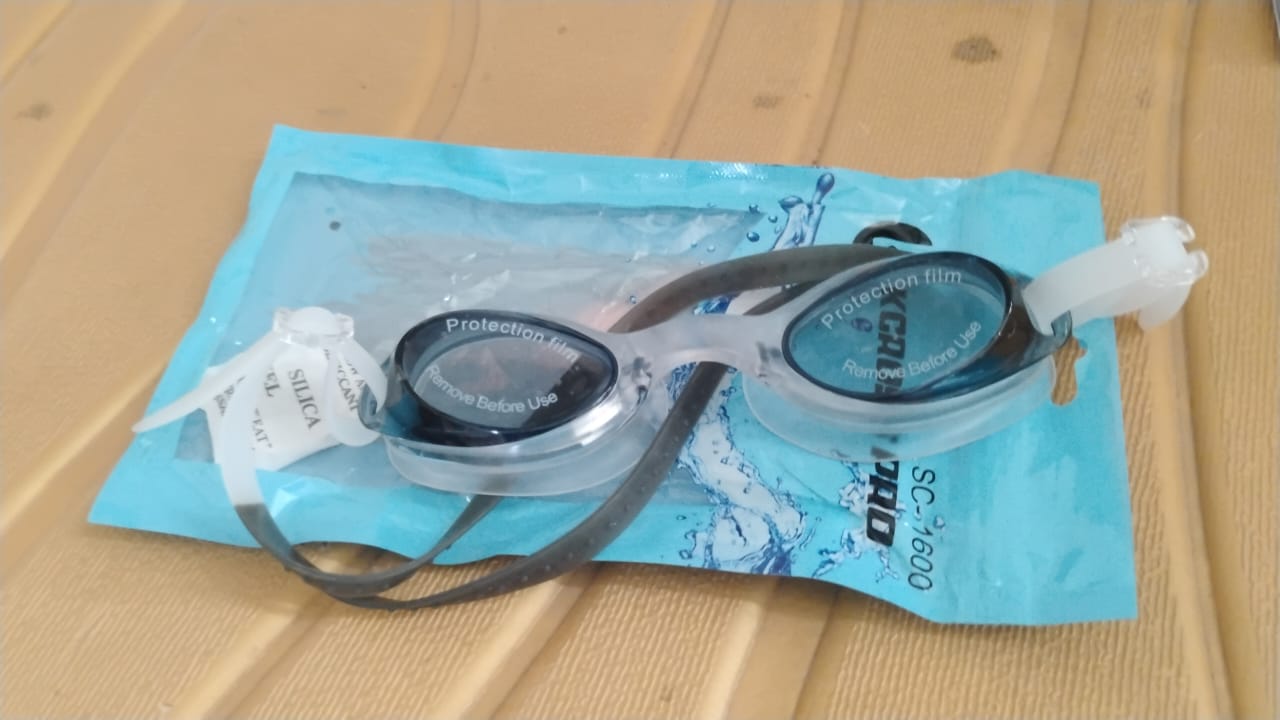 Konex swimming goggles side view with strap