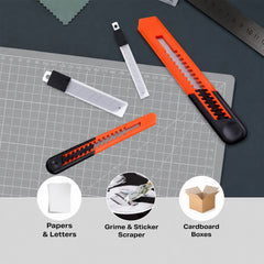 Utility knife set included in packaging designed for handling cardboard and paper.