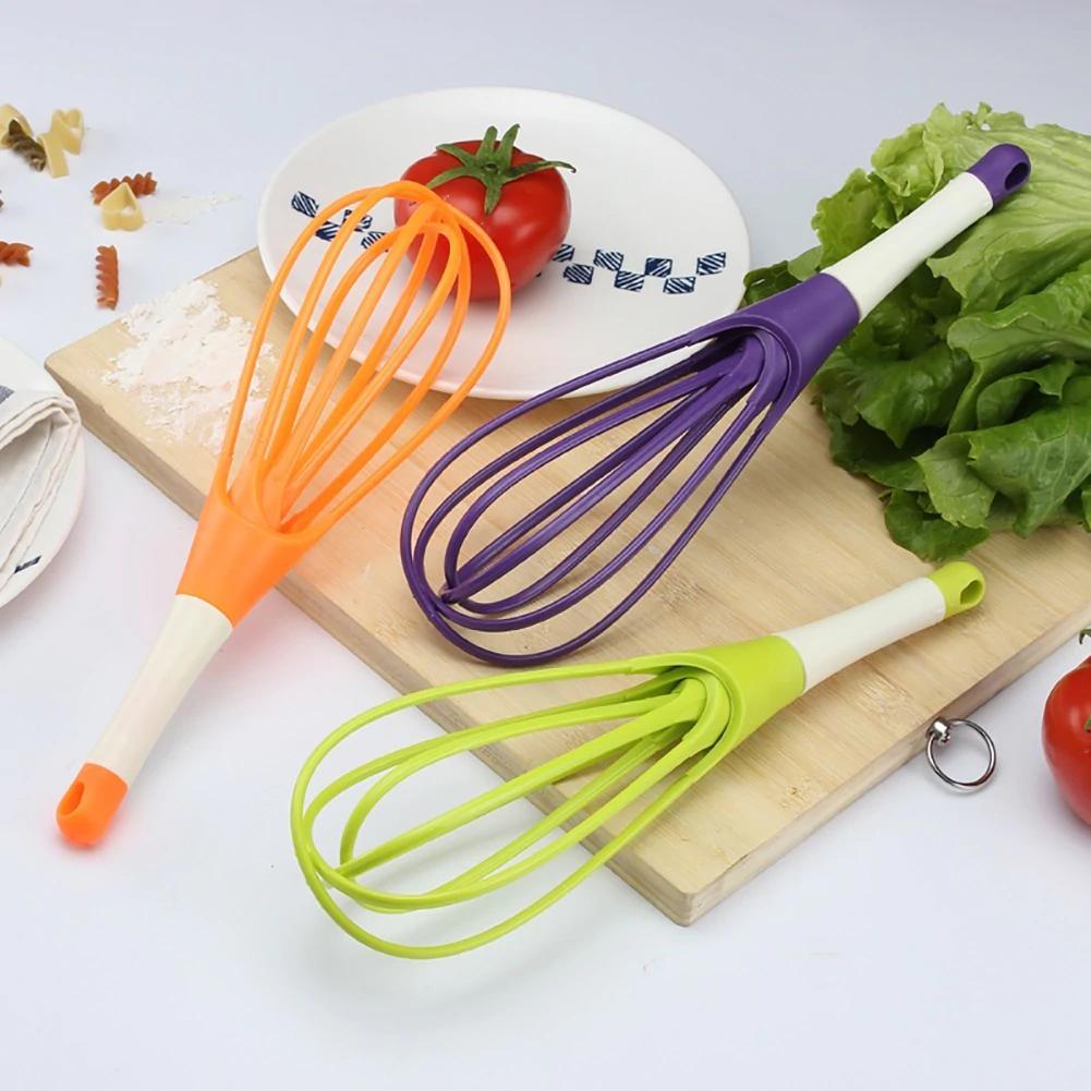 Plastic balloon whisk for milk, coffee, eggs, and juice with ergonomic grip