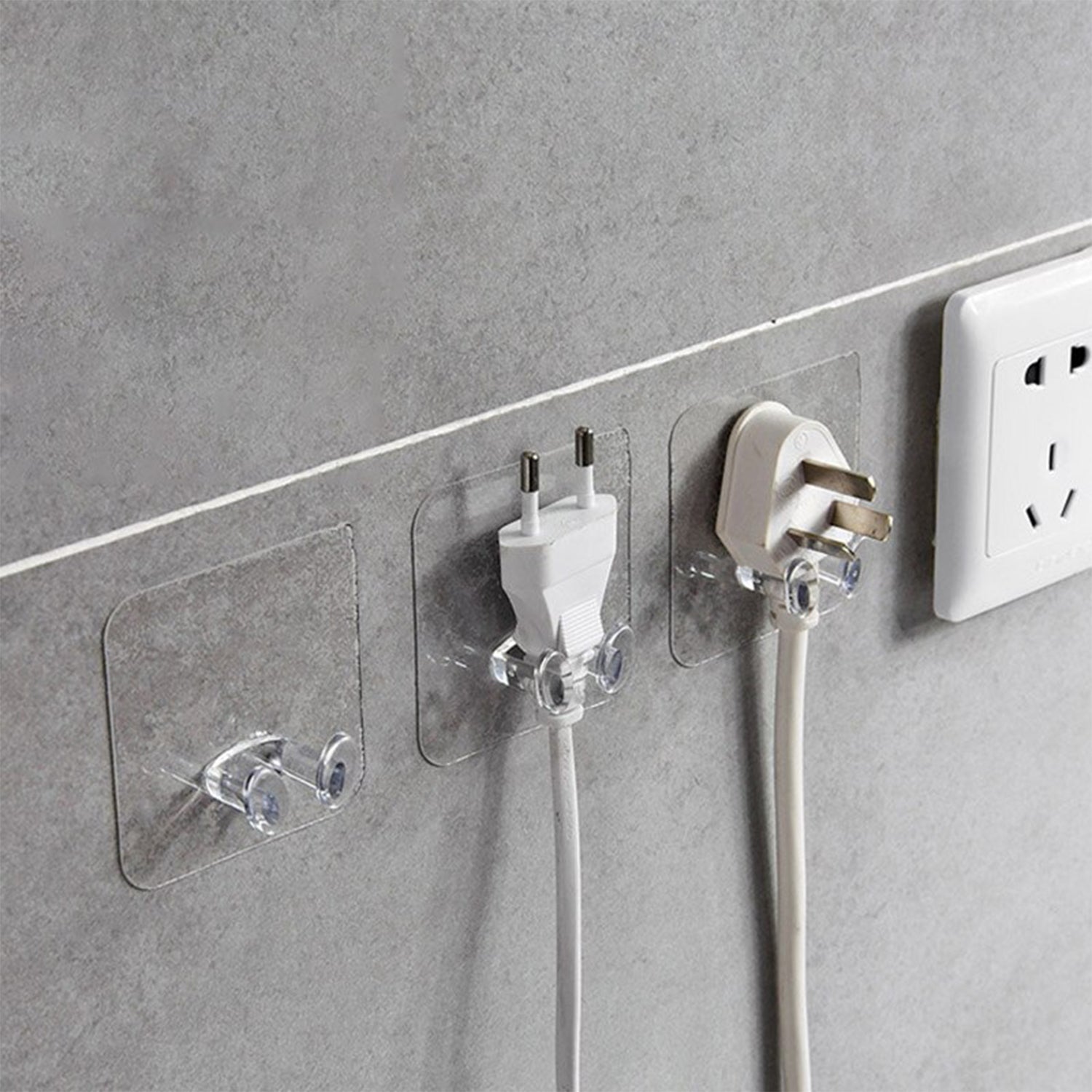 Set of transparent wall hooks organized in kitchen setting