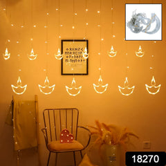 Diya Curtain String Lights with 12 LED diyas draped elegantly for Diwali decoration.