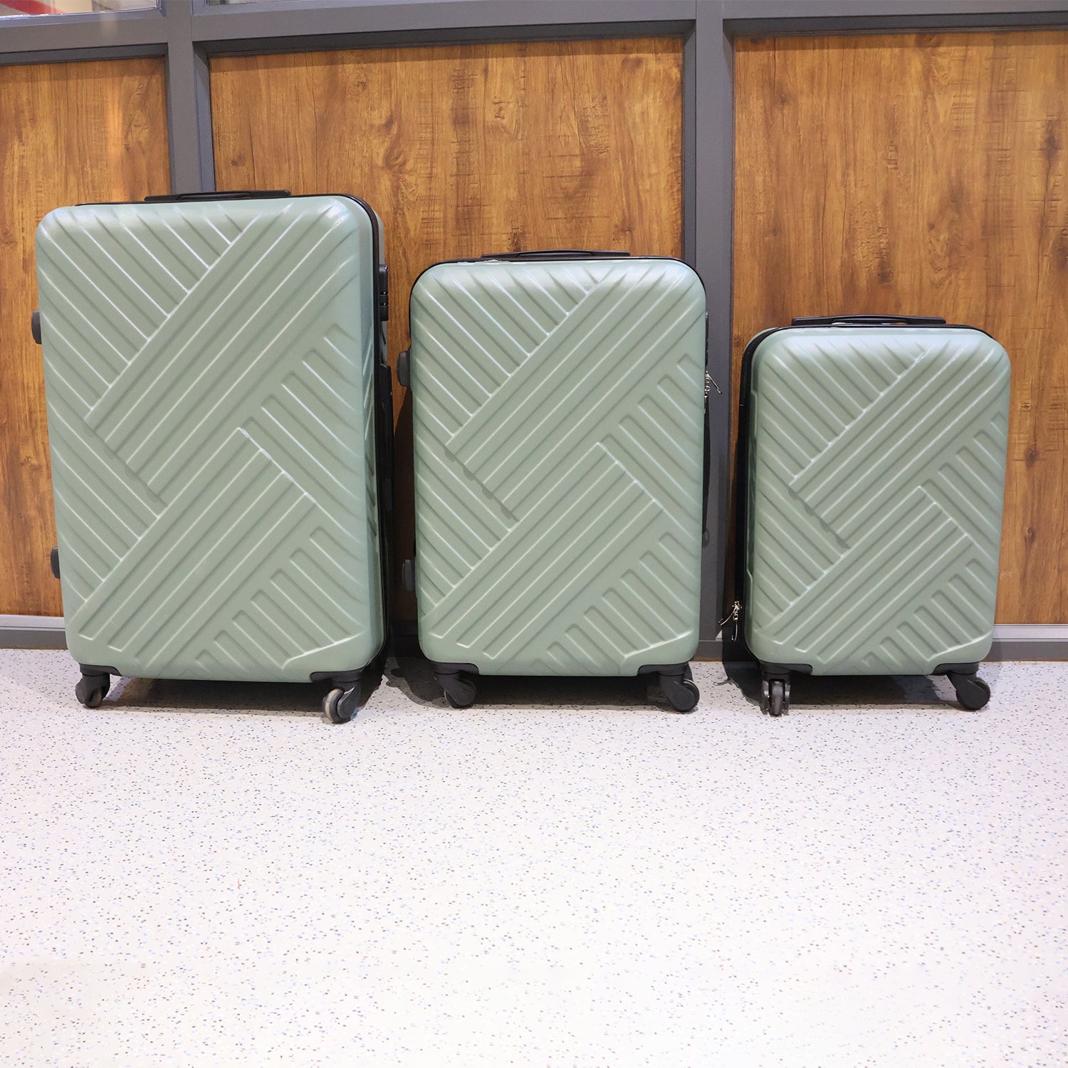 Set of three hard case travel suitcases ready for air travel