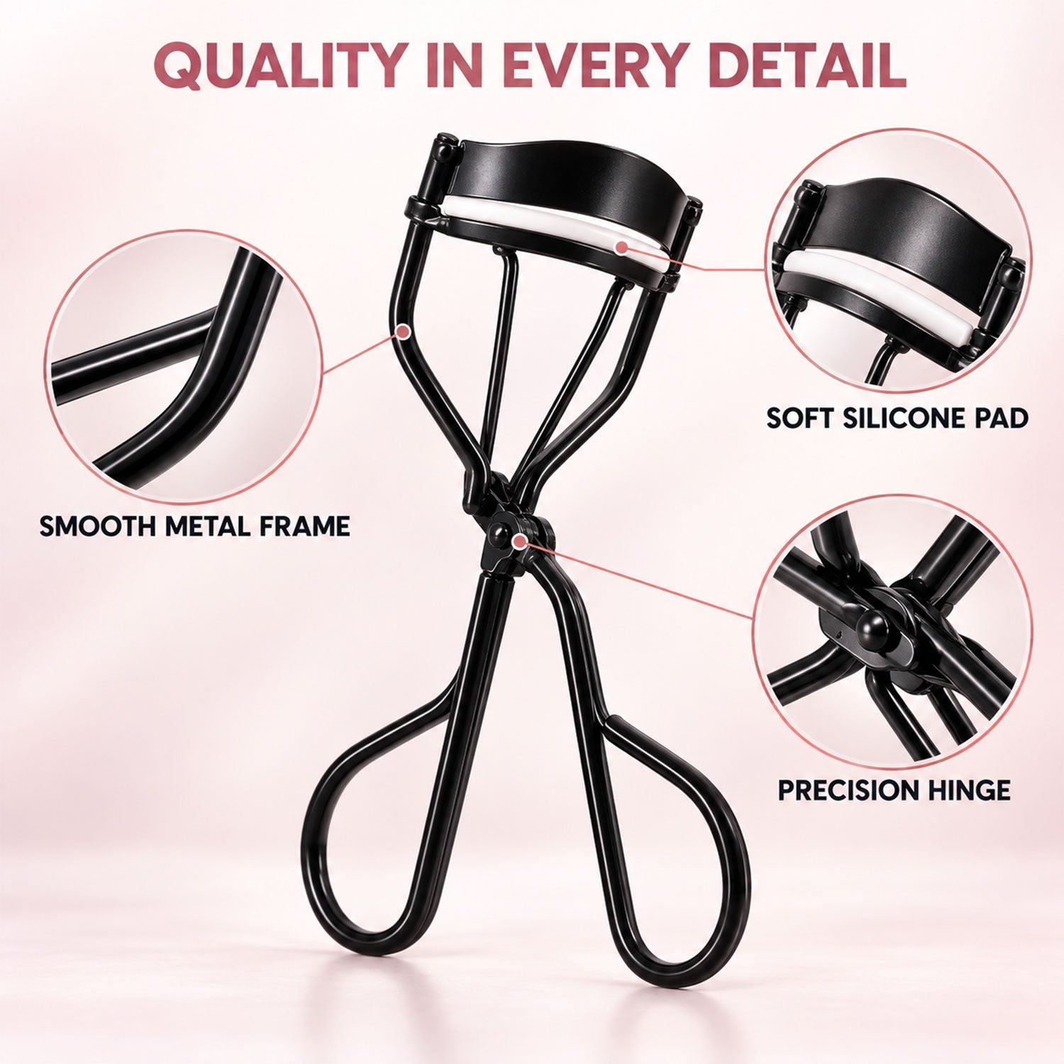 A black metal eyelash curler with a white silicone pad, highlighting the smooth frame and precision hinge.