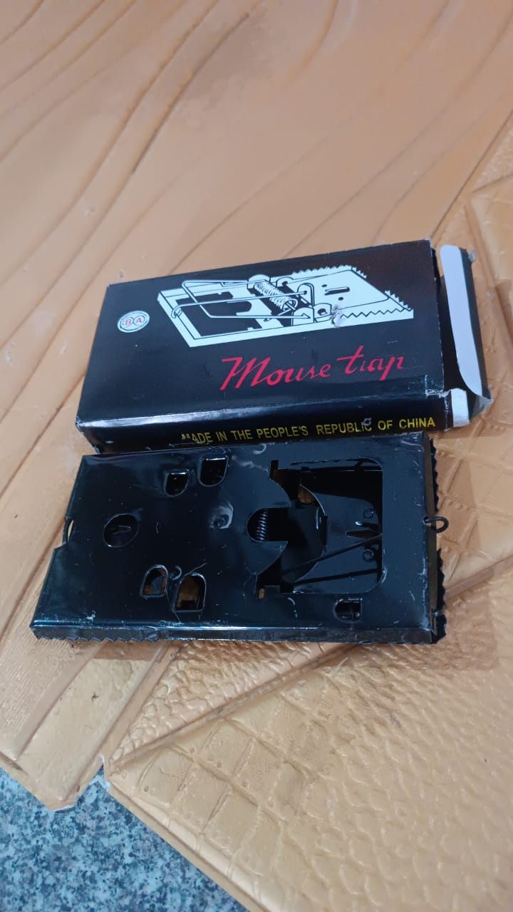 The compact design of the metal mouse trap, ideal for discreet placement.