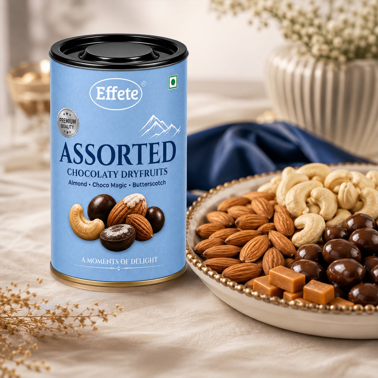 Effete assorted chocolaty dryfruits gift tin from a slightly elevated view.