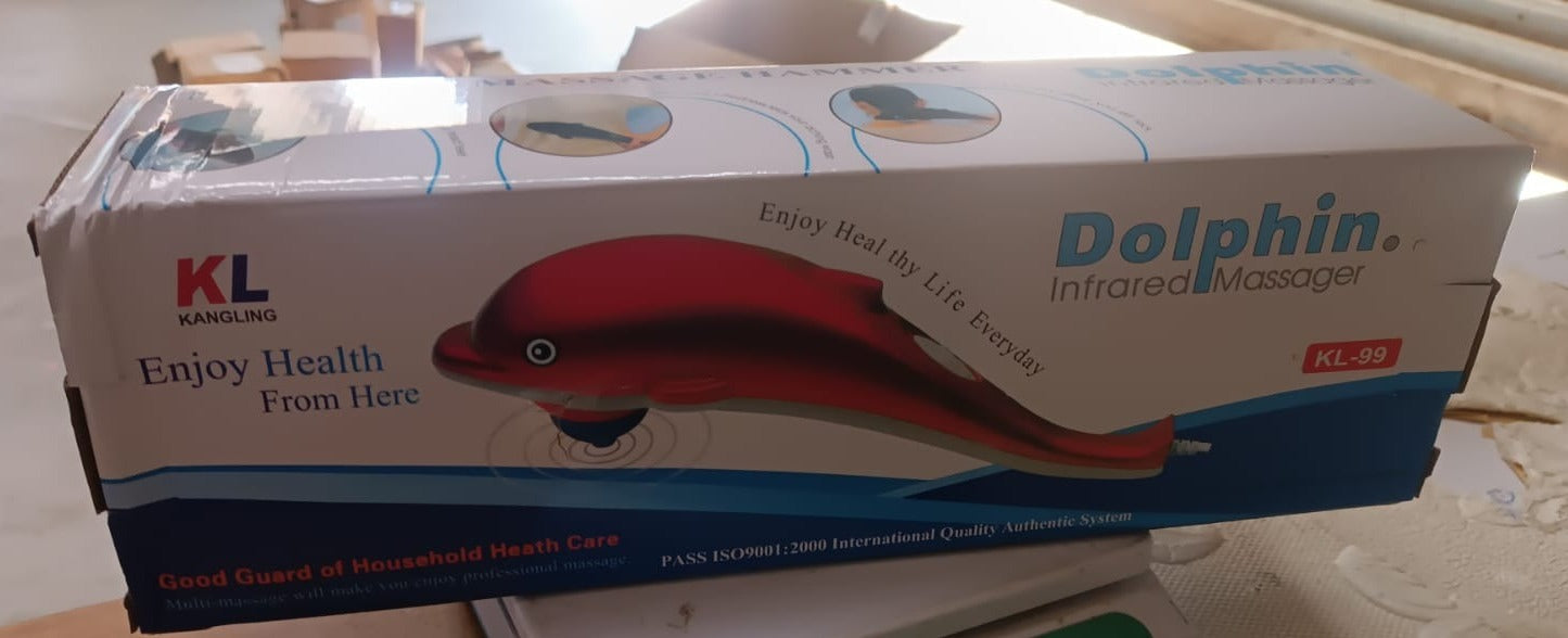 Person relaxing with Electric Dolphin Massager for soothing relief