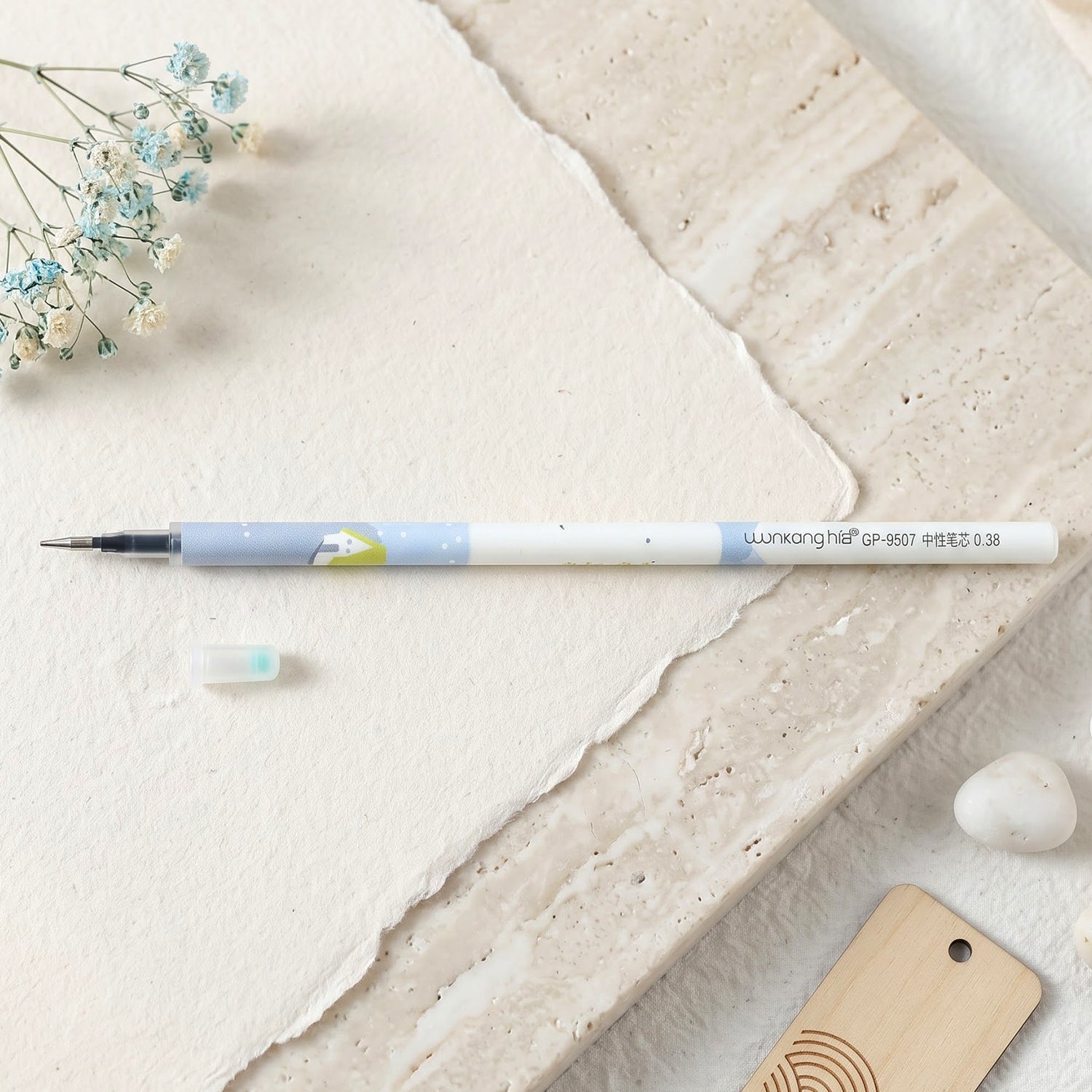 Ball pen held in hand while writing