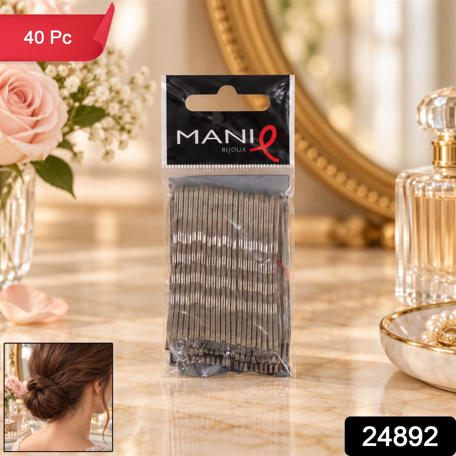 A clear plastic package of grey metal bobby pins stands upright on a marble vanity, with a small inset image of a woman's