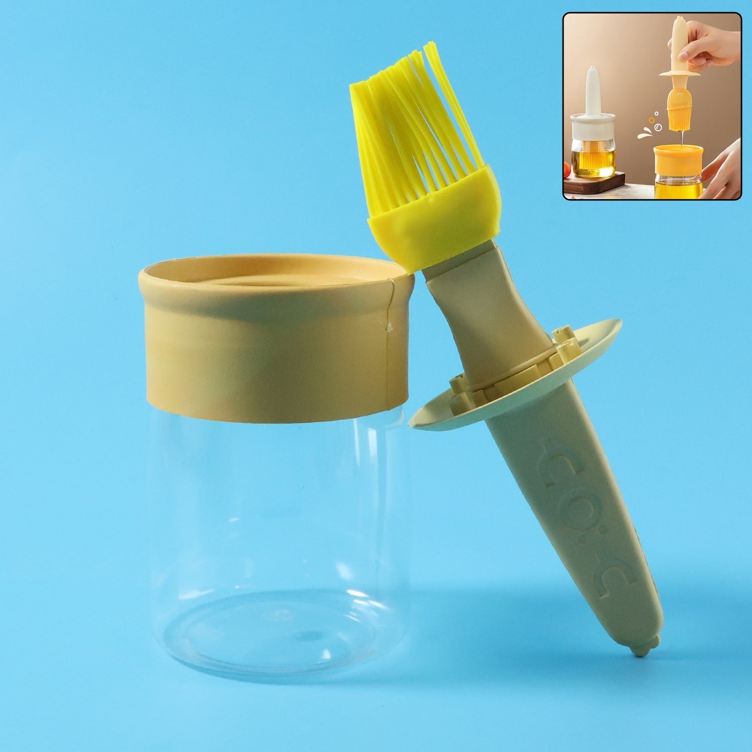 2-in-1 oil dispenser bottle with integrated silicone basting brush placed on kitchen counter