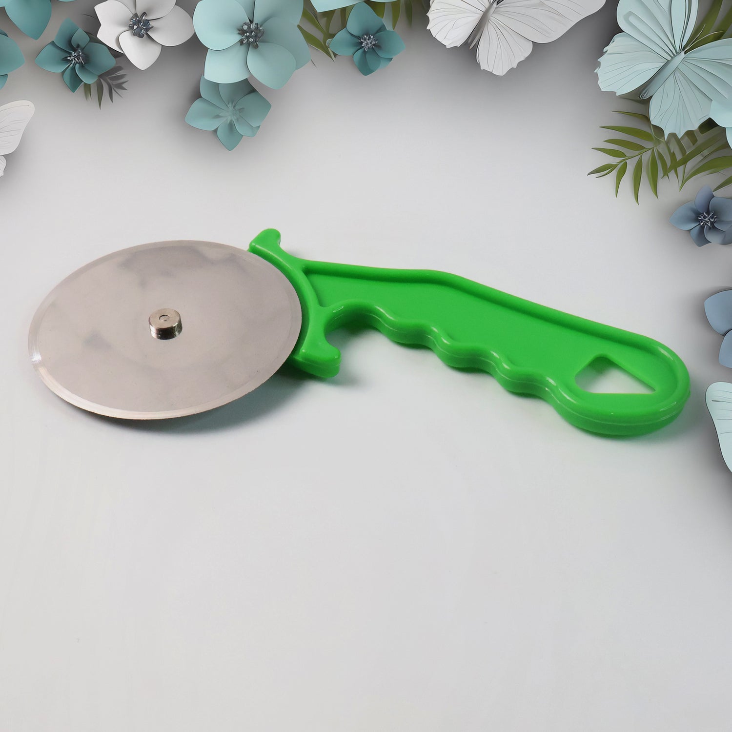 Quickslice pizza cutter actively slicing a hot pizza