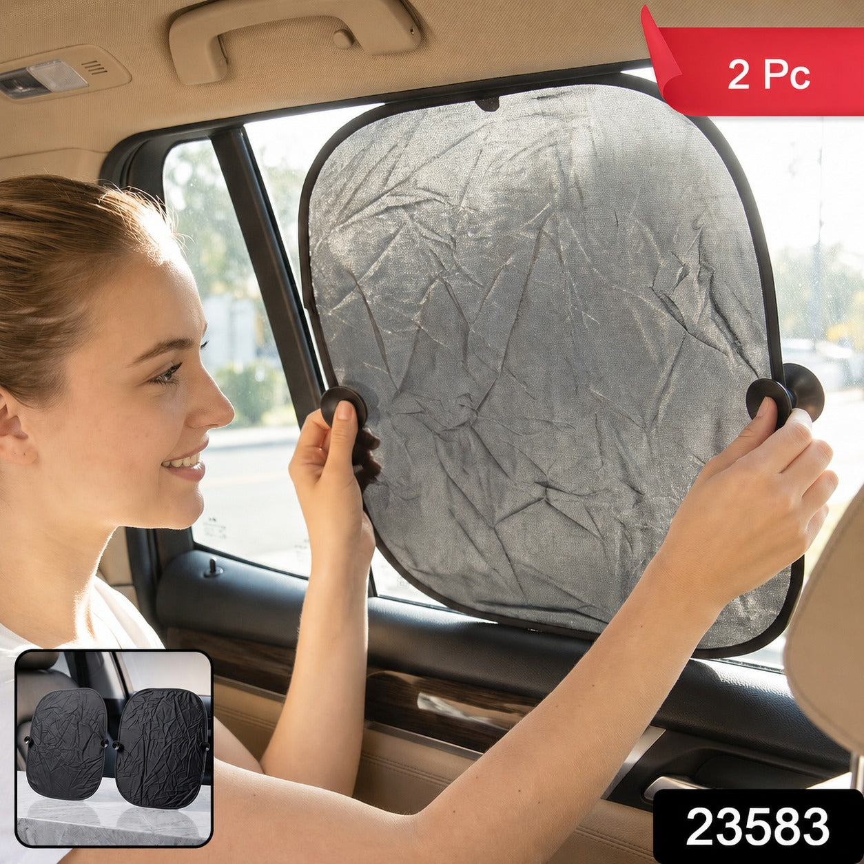 A woman installs a black foldable sunshade with suction cups on a car's side window, with a small inset showing two â€“ view 2