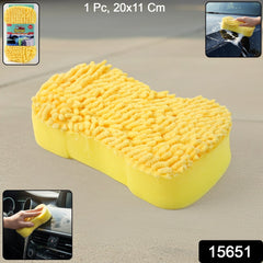 Hand holding wash block sponge for car cleaning