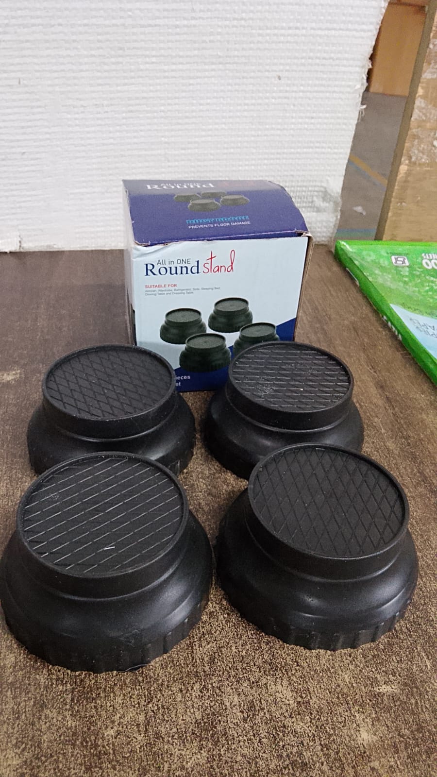 Plastic legs stand shown in usage.