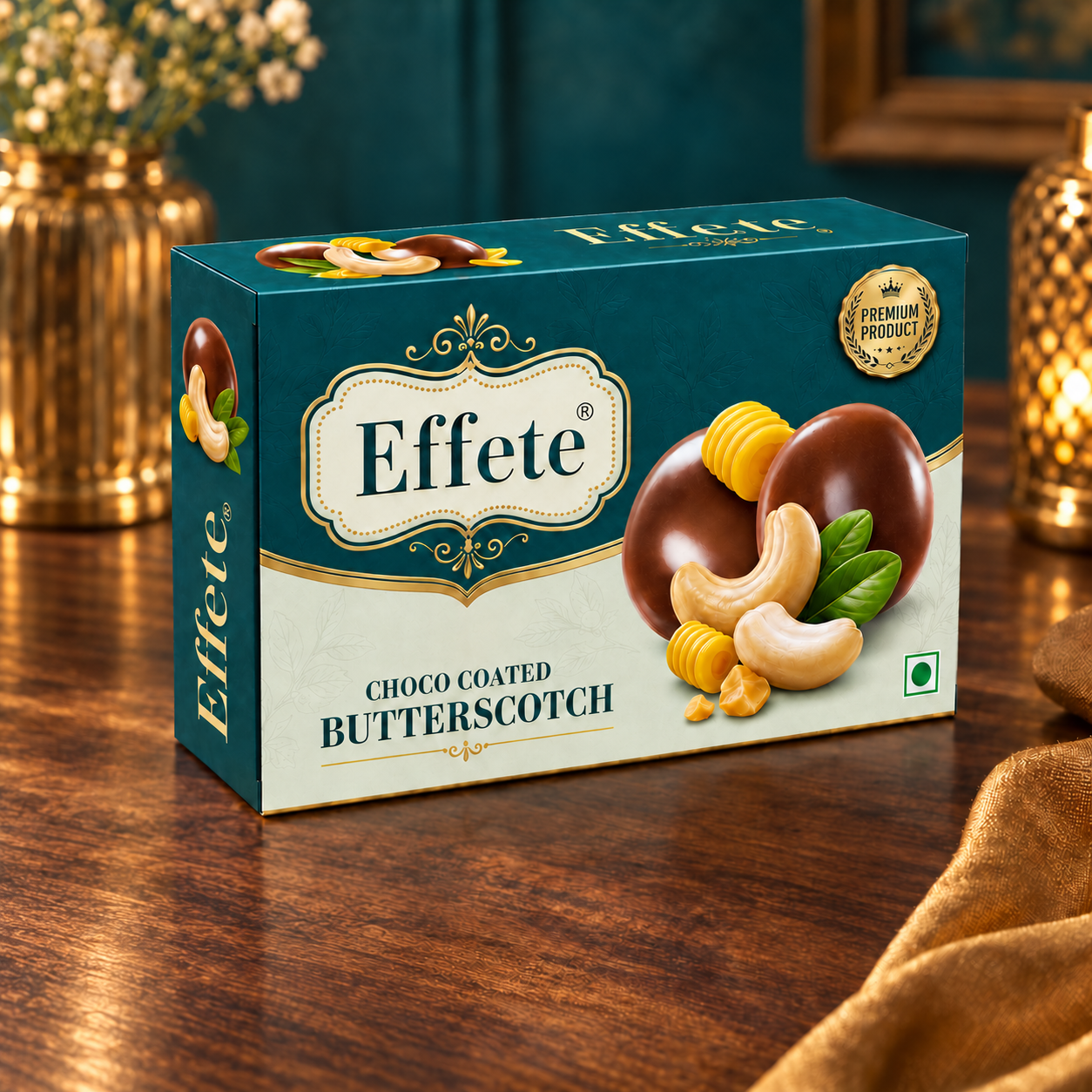 Effete Choco Coated Butterscotch box on a wooden table with blurred decorative elements in the background.