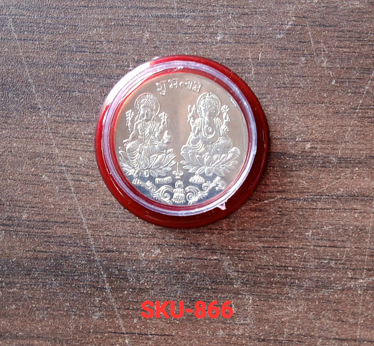 Goddess Lakshmi Pooja Coin on cloth background