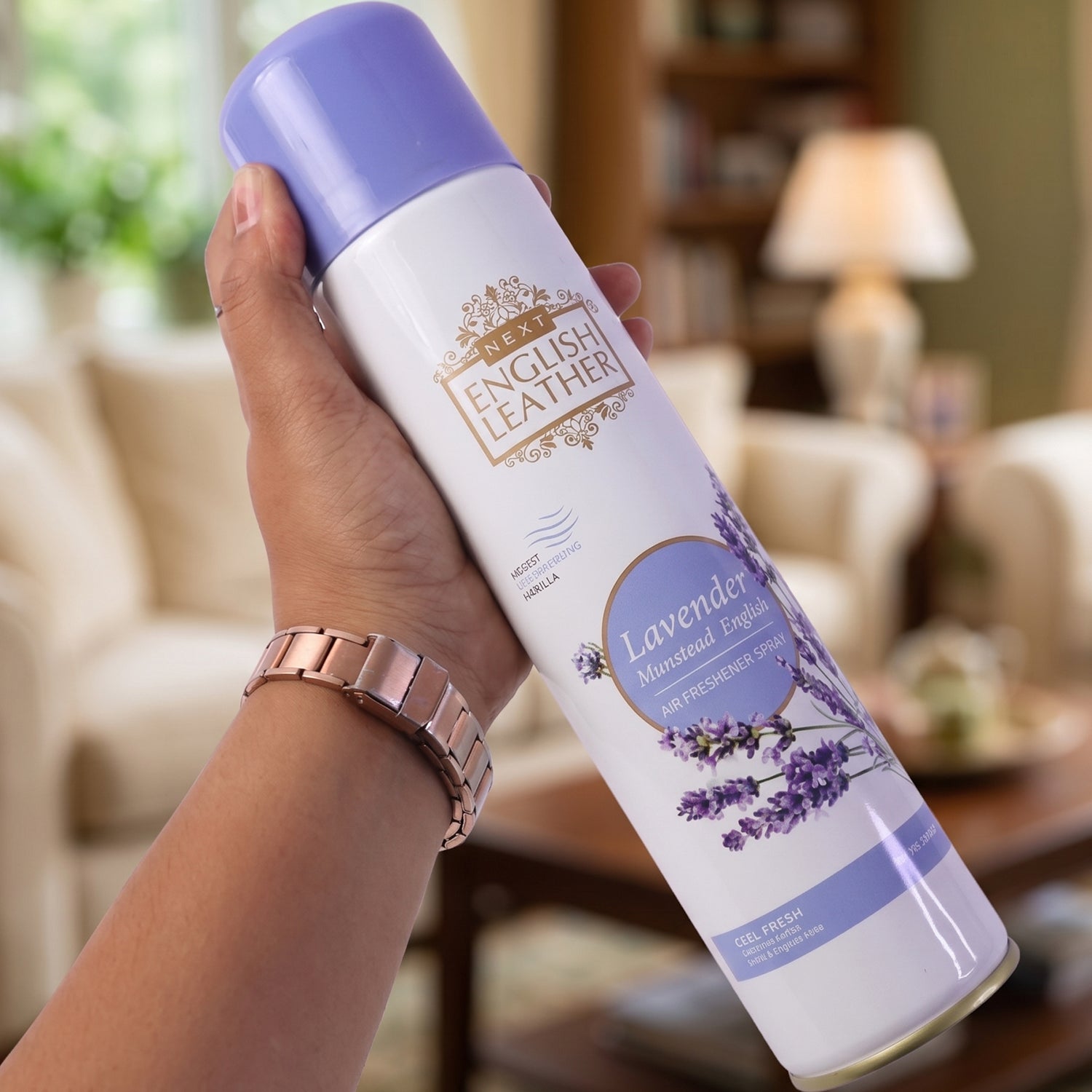 Air Freshener Spray placed next to indoor plants