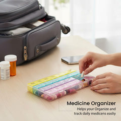 Open weekly pill case with multicolored lids displayed