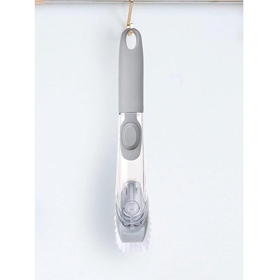 Liquid dispensing dish cleaning brush close-up