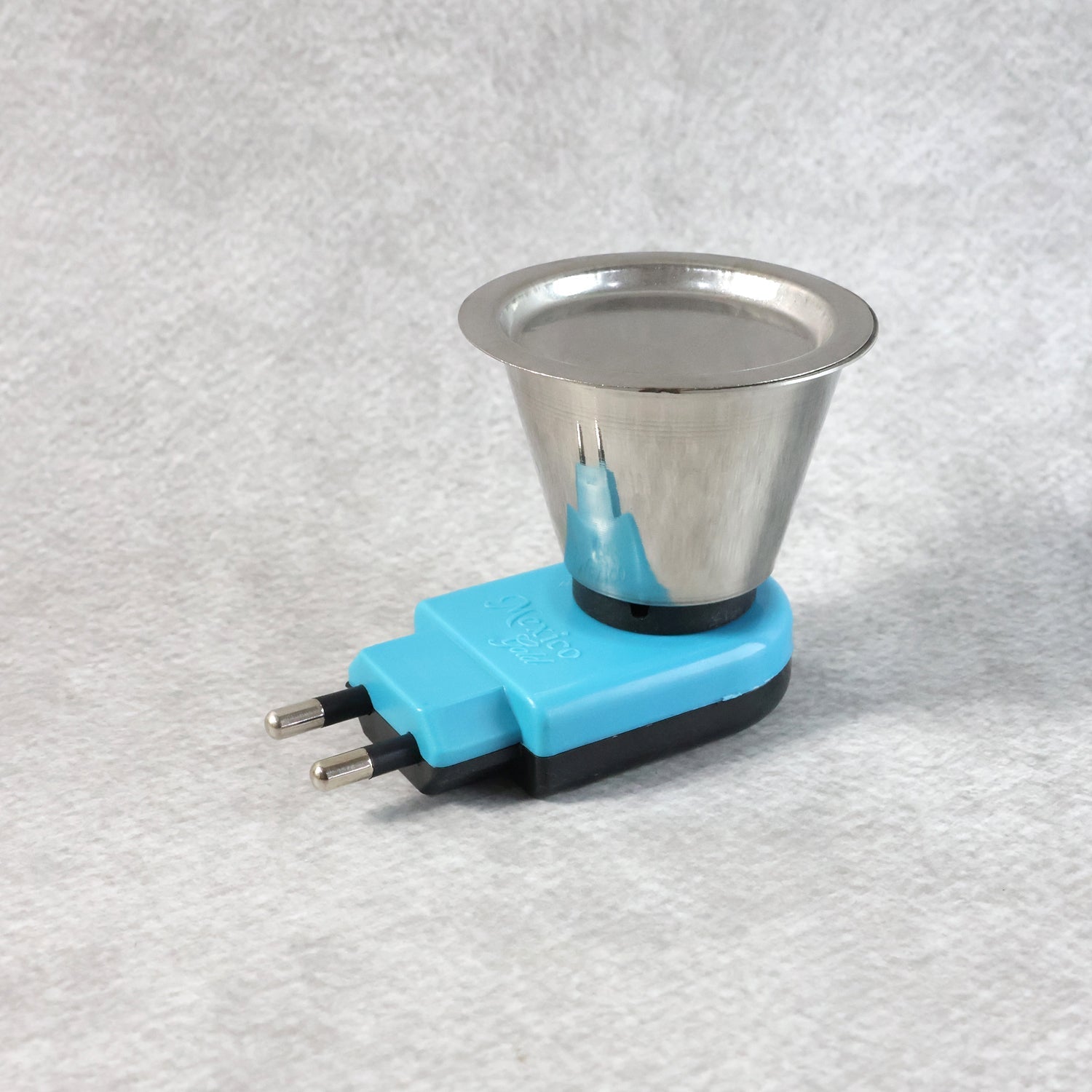 Close-up of electric bakhoor burner surface