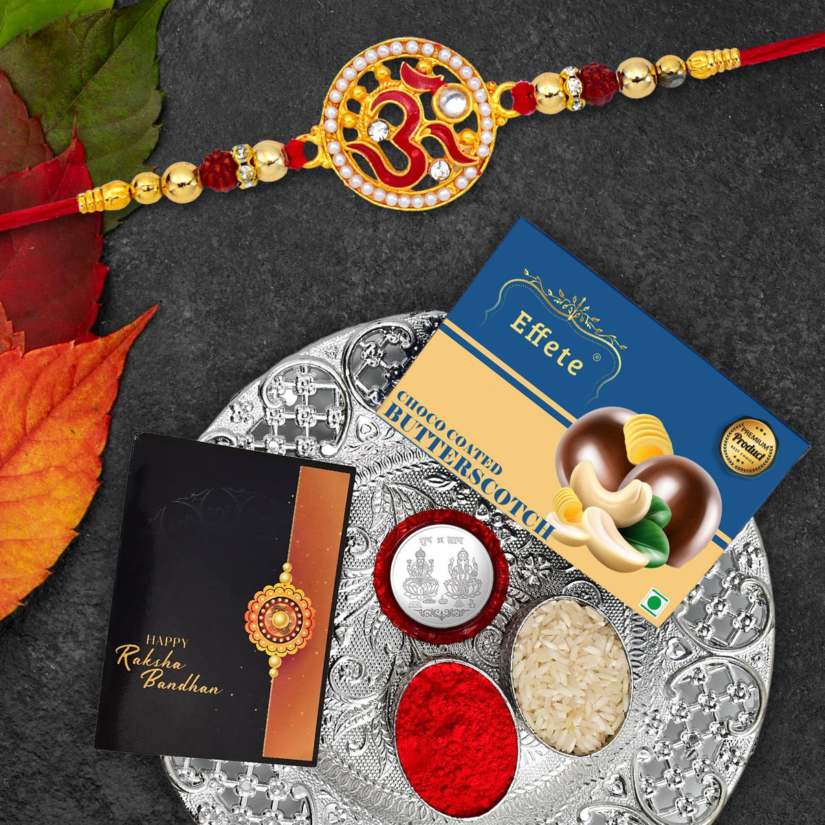 (K1_272_DS+BS32) Rakhi Combo with Chocolate Butter Scotch 32gm & Silver Pooja Thali, Pooja Coin & Greeting Card, Rakhi gift set | Rakhi thali | Rakhi with plate | rakhi gifts | rakhi thali set | rakhi hamper for brother | rakhi with chocolat