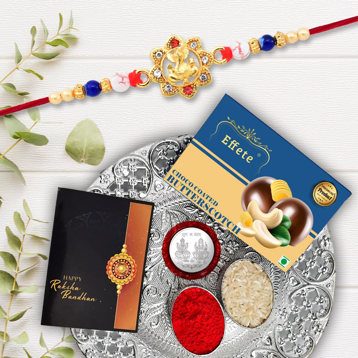 (K1_14_DS+BS32) Rakhi Combo with Chocolate Butter Scotch 32gm & Silver Pooja Thali, Pooja Coin & Greeting Card, Rakhi gift set | Rakhi thali | rakhi for brother kids | Rakhi with plate | rakhi hamper for brother | rakhi for brother with choc
