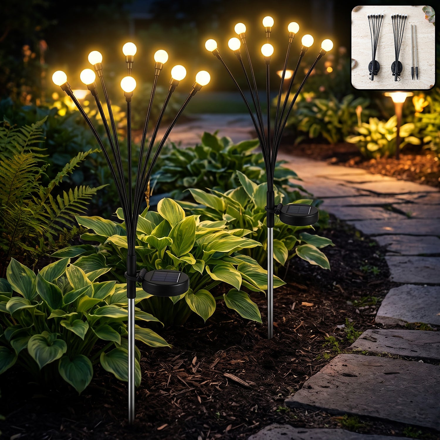 Two solar-powered firefly garden stake lights illuminate a lush green garden path at dusk.