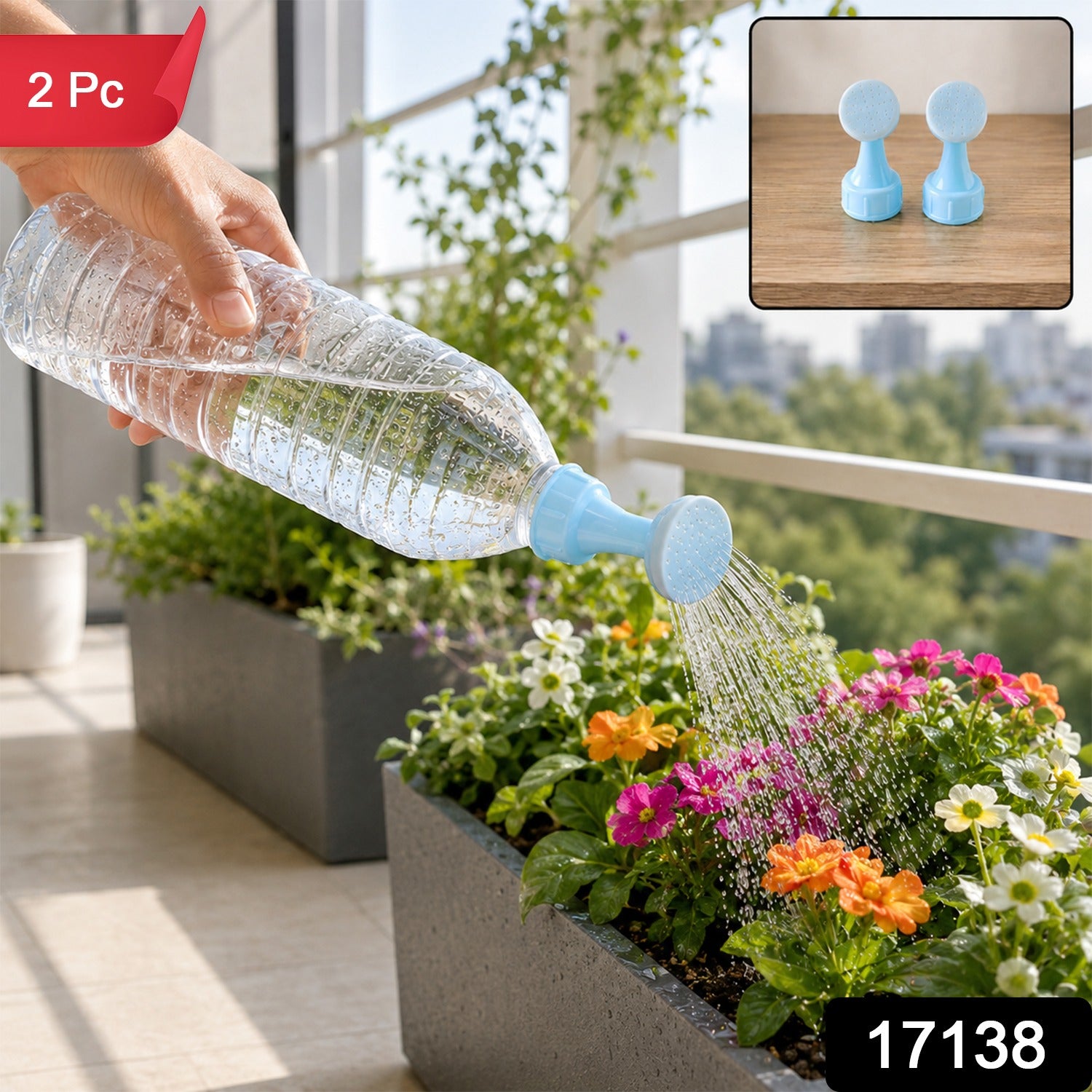 A hand holds a plastic bottle with a light blue sprinkler nozzle, watering colorful flowers in a planter on a balcony.
